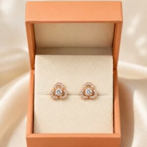 Pair of rose gold floral halo stud earrings presented inside an elegant jewellery gift box