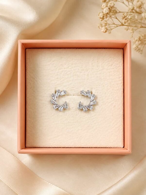 Platinum polished crystal fan open hoop earrings presented in an elegant jewellery gift box