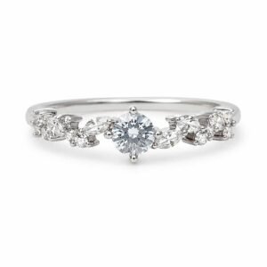 Fiora platinum-polished floral solitaire ring with a round centre stone and marquise leaf side stones on white