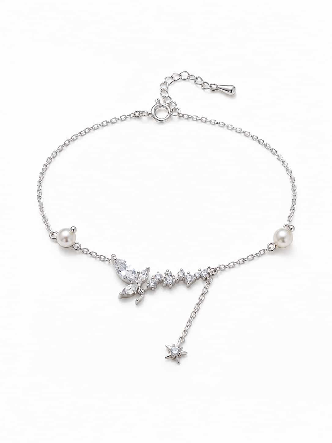 Celestia butterfly and pearl sparkle bracelet with clear stones, star charm and delicate silver-tone chain