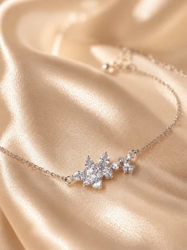 Close-up of Crystal Bloom bracelet with marquise and round stone floral centrepiece