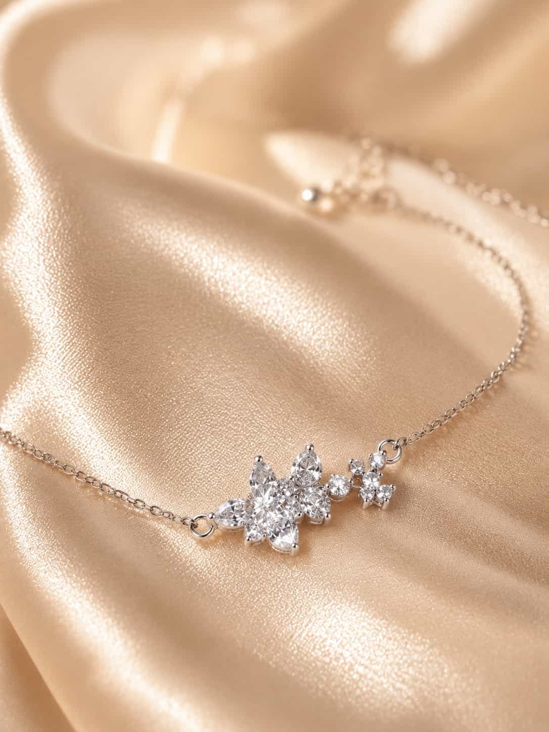 Close-up of Crystal Bloom bracelet with marquise and round stone floral centrepiece