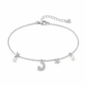 Celestial moon, star and pearl charm bracelet with fine chain and adjustable clasp on white background