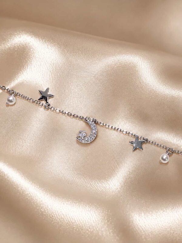 Celestial moon, star and pearl charm bracelet with sparkling crescent moon on champagne satin